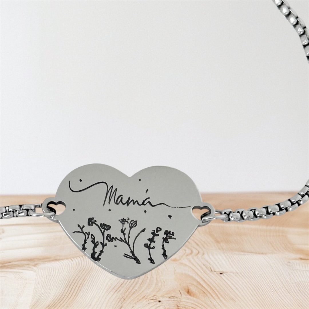 Pulsera personalizada de acero con corazón grabado