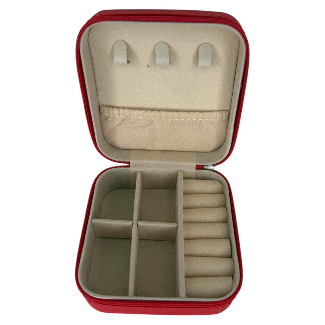 Joyero elegante con diseño rojo e interior compartimentado para joyas