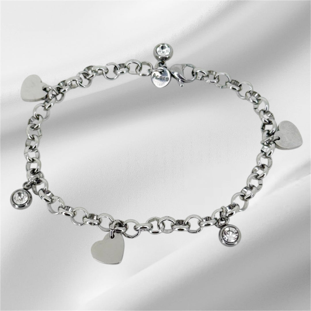 Pulsera de acero con corazones y circonitas personalizable con grabado