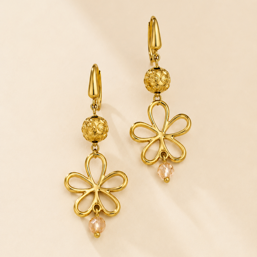 Pendientes Liora de flor dorados con cristal facetado de sfinge