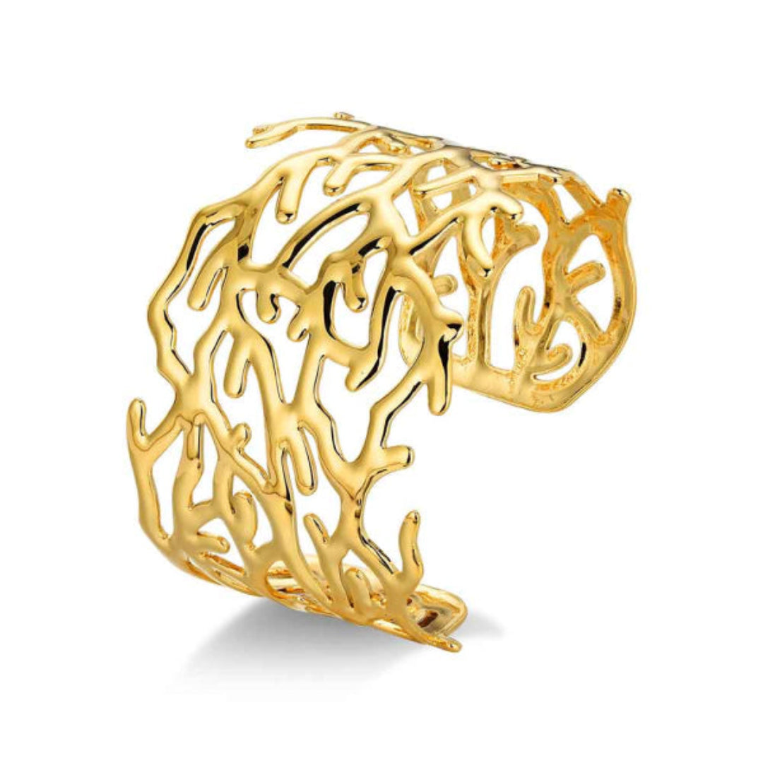 Brazalete tipo coral Rocío Martín, de acero 316 chapado en oro 18K, diseño abierto waterproof con acabado brillante.