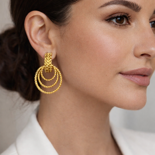 Pendientes de aros dobles trenzados en acero con baño en platino