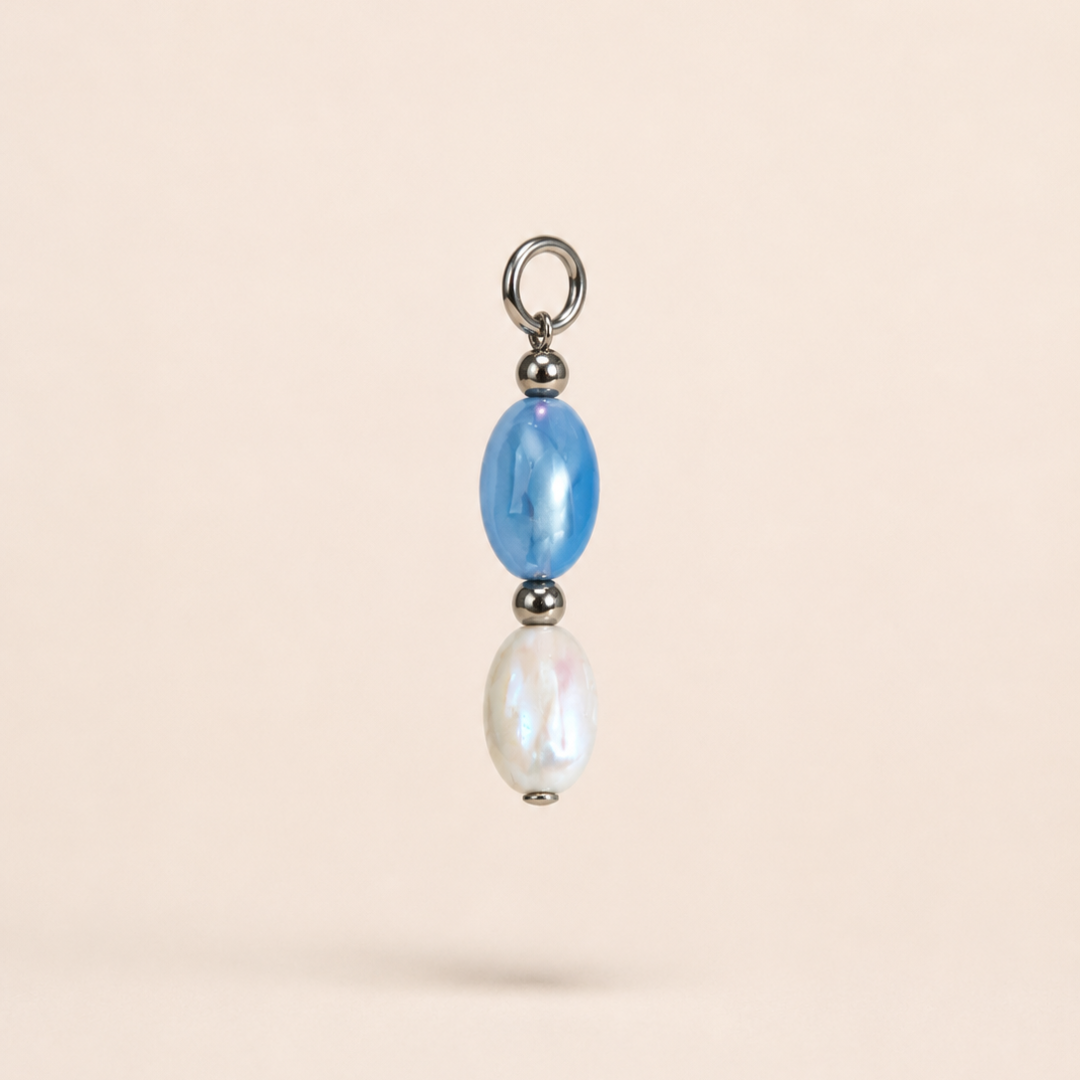 Charm Armonía celeste y blanco de sfinge 
