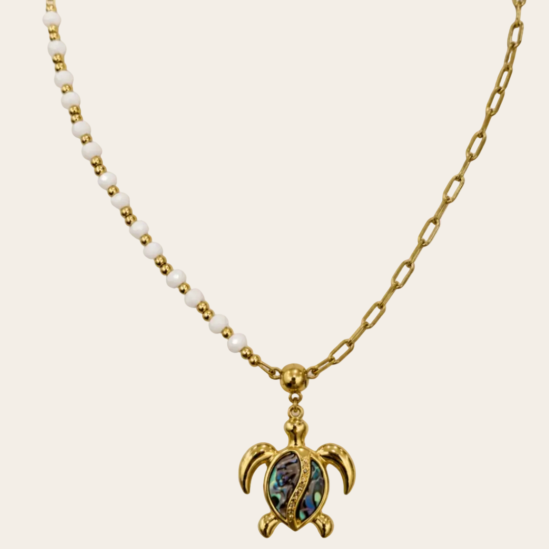 Collar tortuga Nalume oro y abalón con cristal blanco