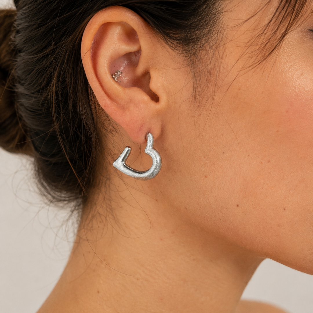 Pendientes corazón abiertos originales de acero dorado Sfinge