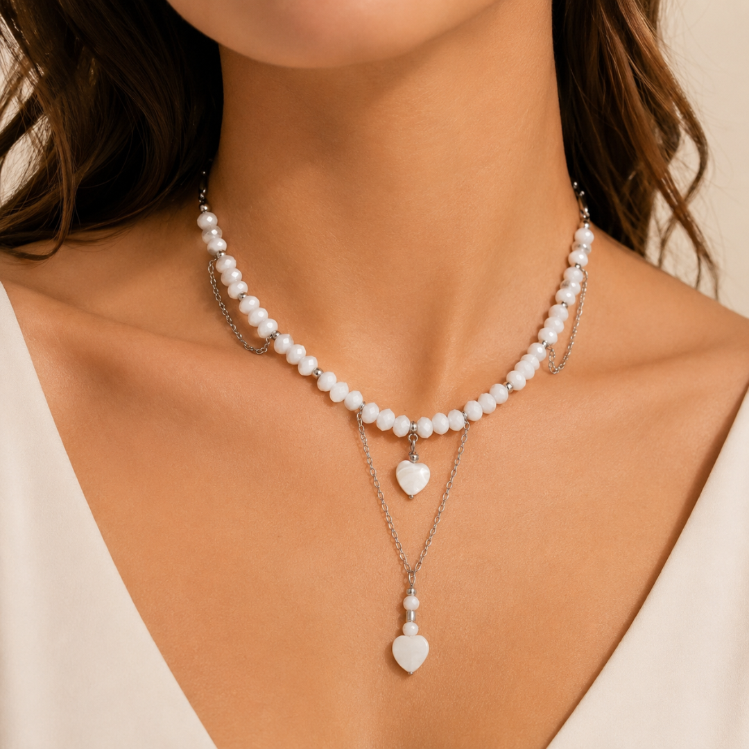Gargantilla blanca de acero inoxidable con cristal checo blanco y corazón de nácar Sfinge, joyas iconicas