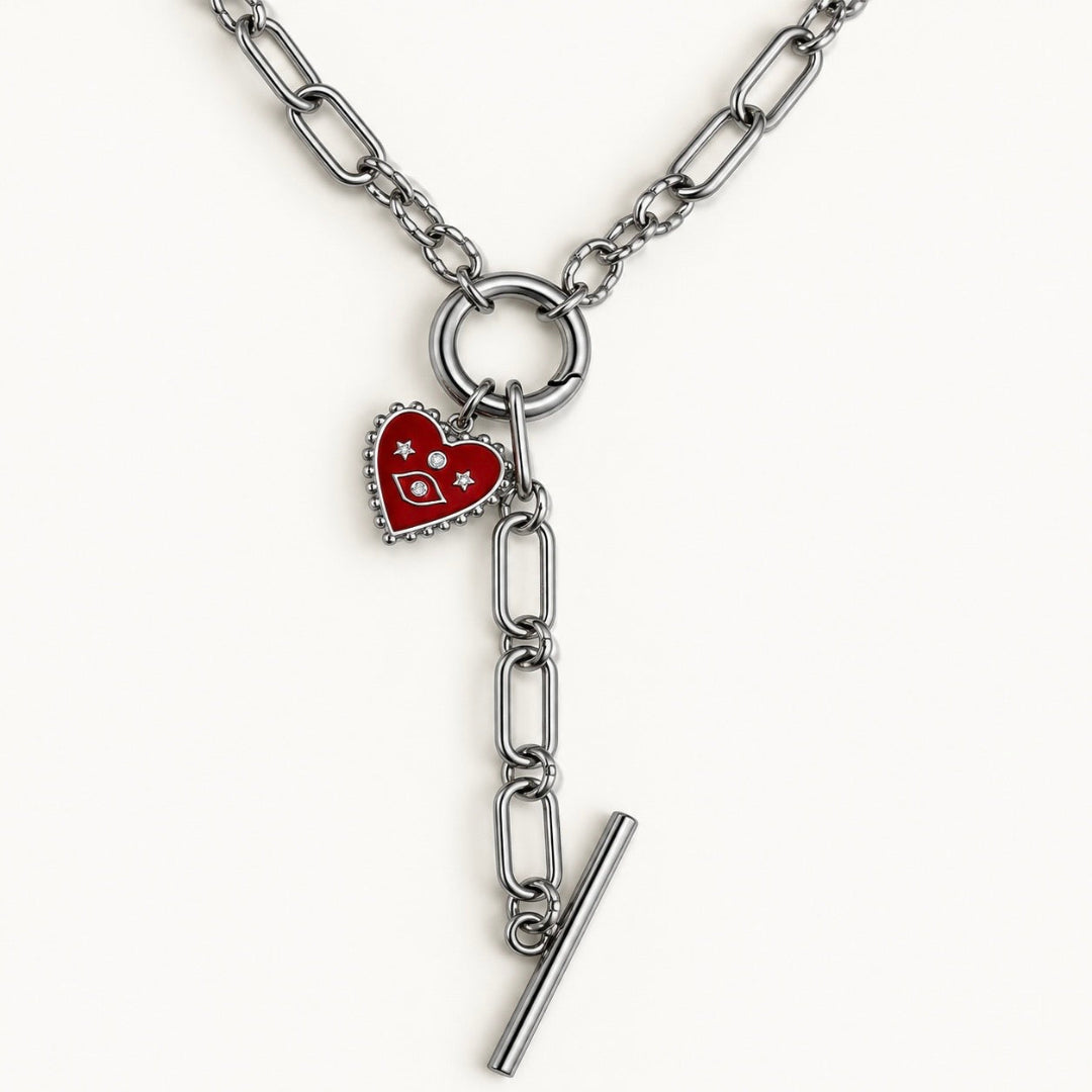Charm Corazón Guardián rojo con ojo, estrellas y borde de bolitas en acabado plateado. coleccion infinity