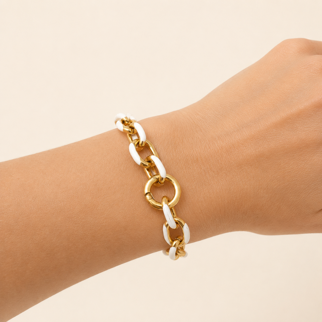 pulsera esmaltada en blaco y acero inoxidable dorado de sfinge infinity