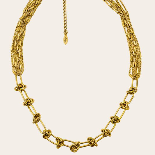 collar de acero dorado sfinge infinity