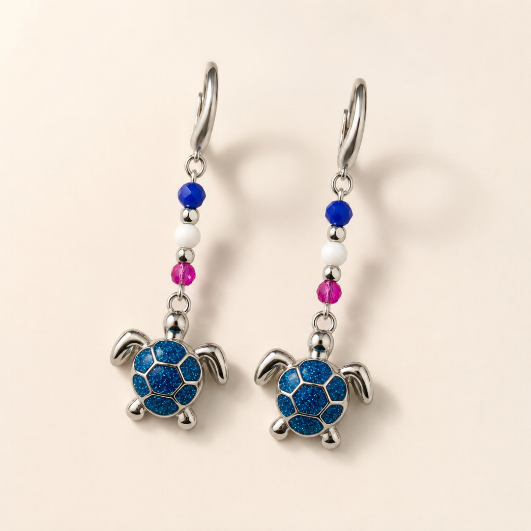 Pendientes tortuga azul con cristales de colores en acero