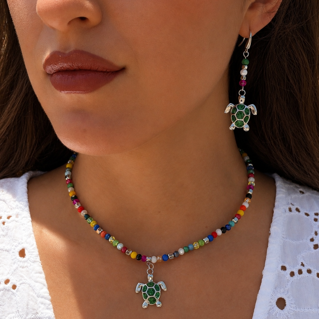 Pendientes tortuga verde con cristales de colores en acero