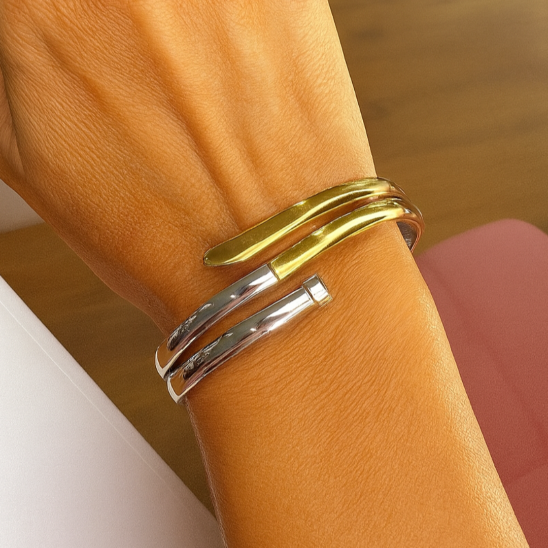 Brazalete bicolor de acero y baño de oro marca Sfinge Joyas