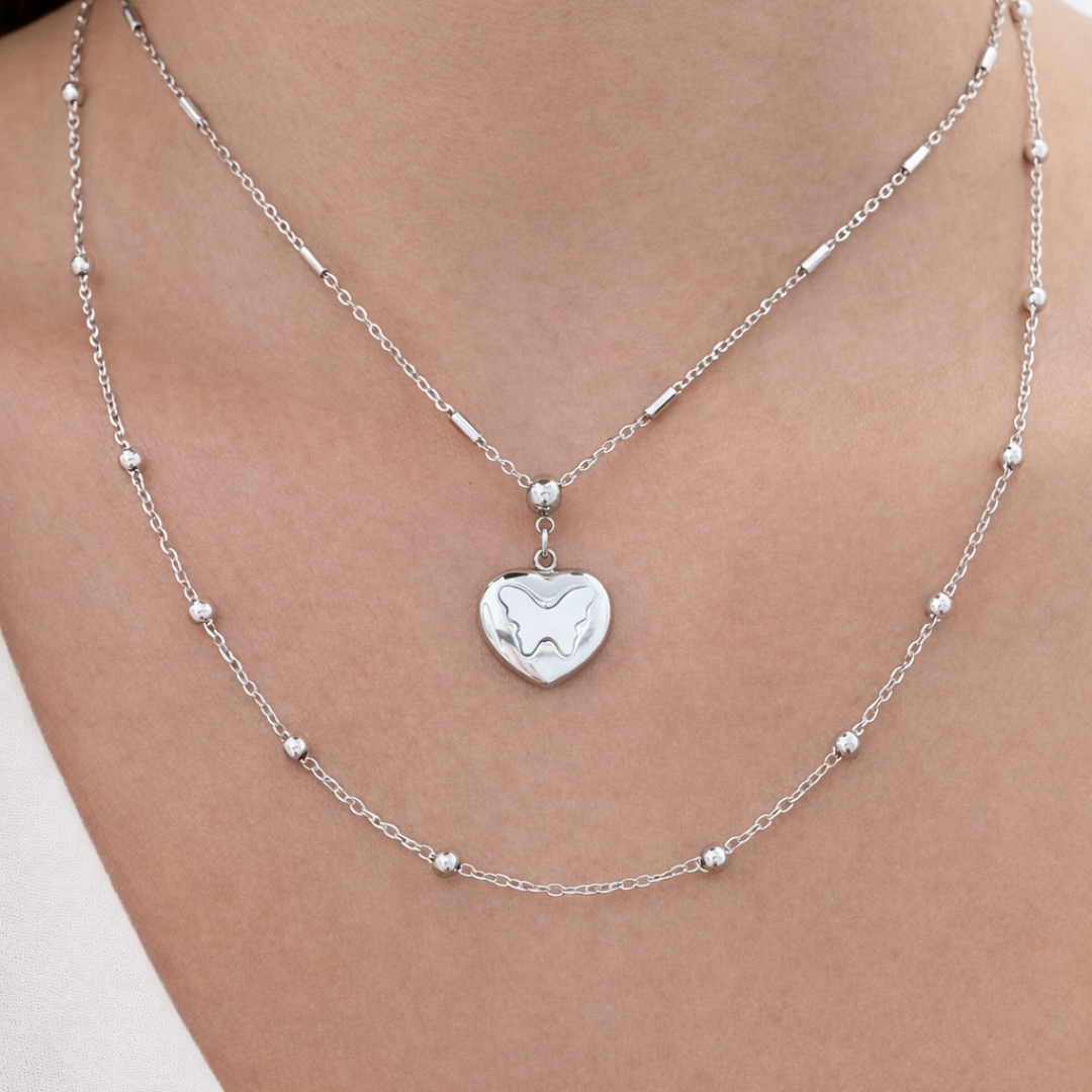 Gargantilla DOBLE VUELO – Collar Doble con Mariposa en Acero