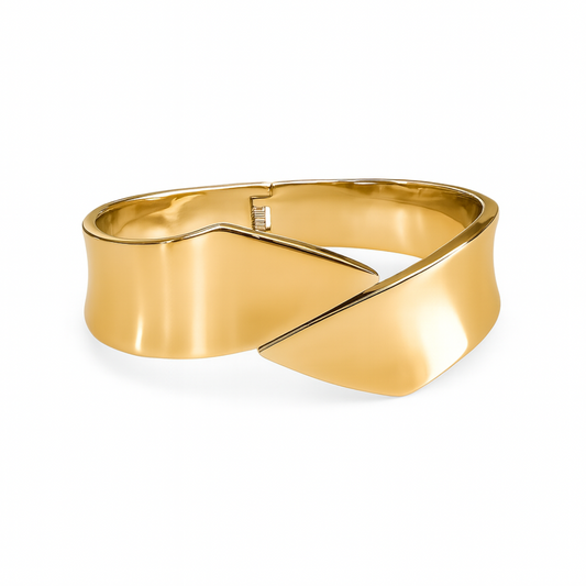Brazalete Eclipse en acero dorado – joya elegante y exclusiva