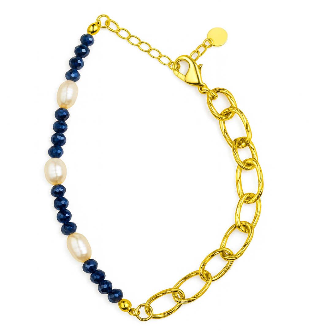 Pulsera Boreal de acero con cristales facetados azules y perlas naturales – acabado plateado.