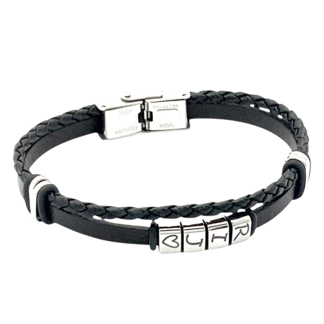 Pulsera personalizada de cuero trenzado negro y acero inoxidable con cubos grabados, diseño unisex de la marca Sfinge.