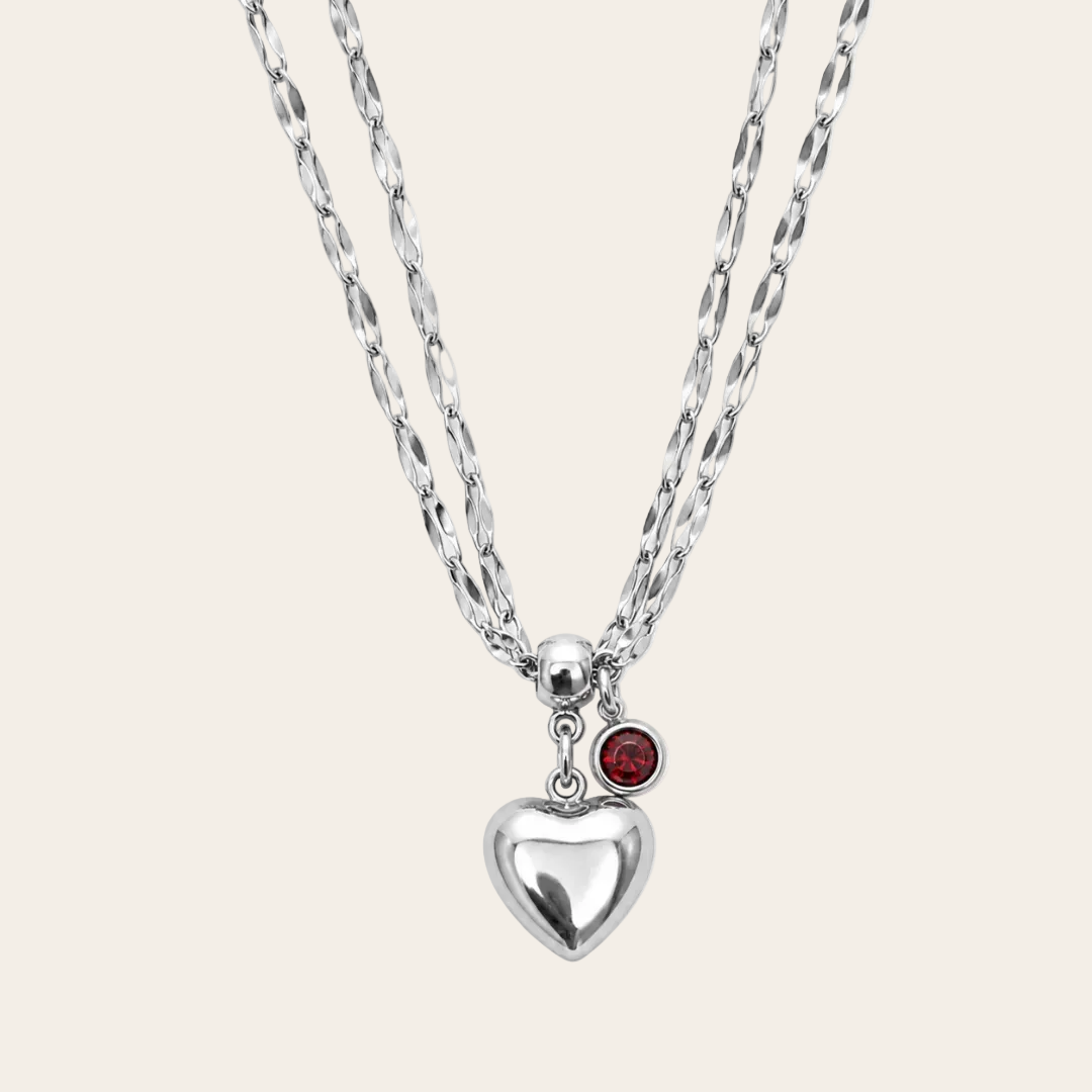 Gargantilla doble corazón abombado con circonita en acero inoxidable