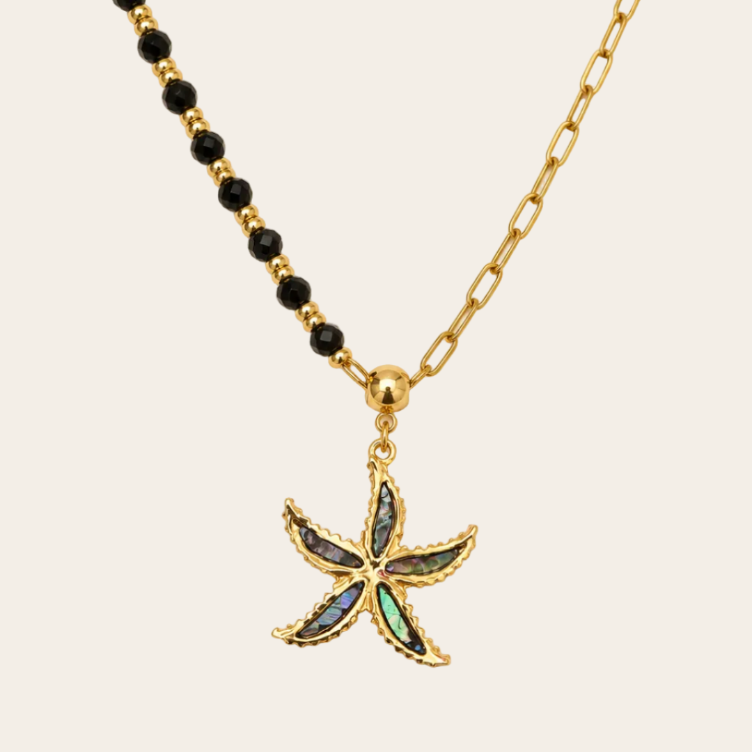 Collar dorado con estrella de avalon y cristales negros