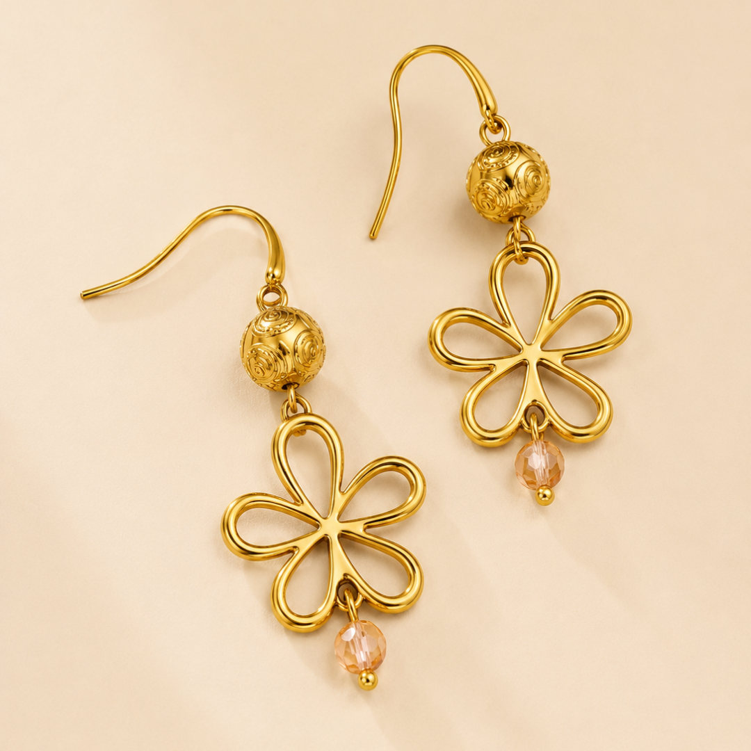Pendientes Liora de flor dorados con cristal facetado acero
