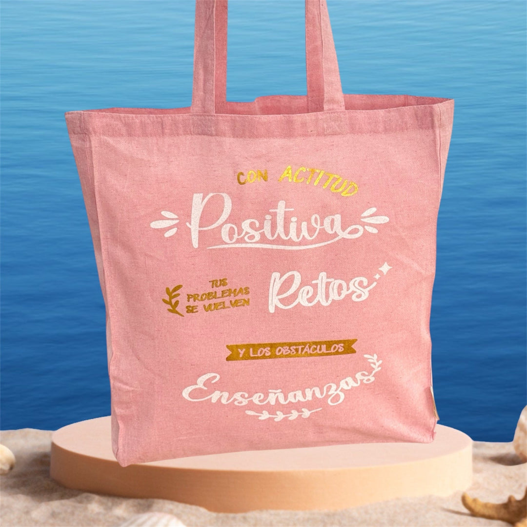 Bolsa tote rosa personalizada con frase positiva - Con actitud positiva tus problemas se vuelven retos - Sfinge Joyas