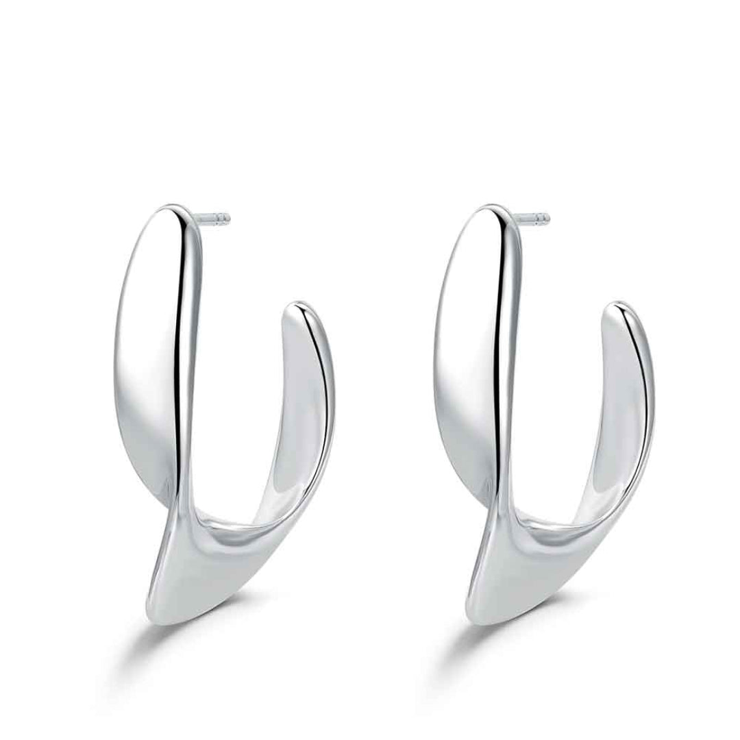 Pendientes de diseño escultural minimal en acero baño en platino